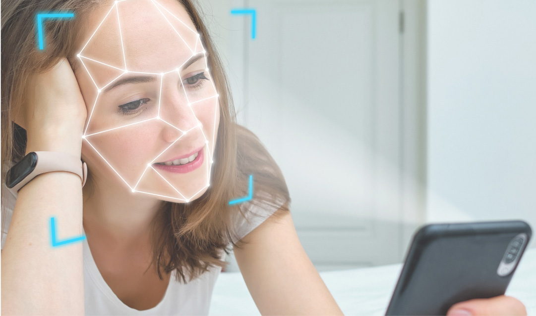 Woman looking at her smartphone with futuristic lines tracing her face.