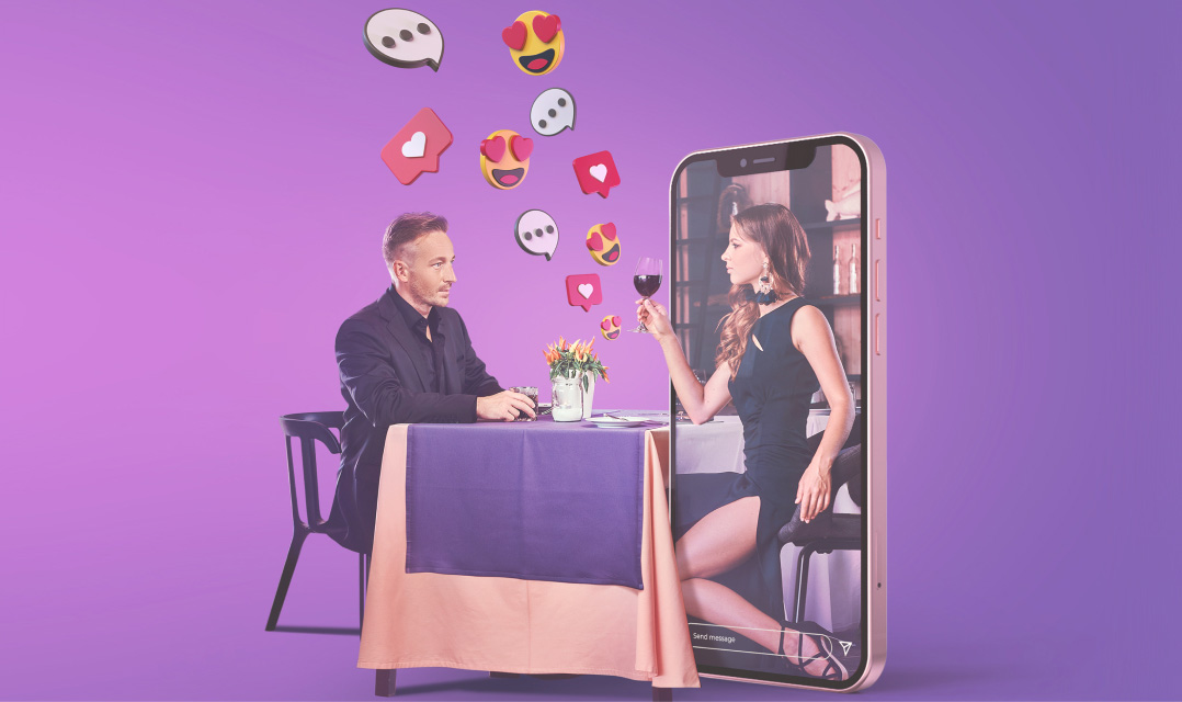 Man at a restaurant table with a woman inside a smartphone screen, holding a glass of wine.