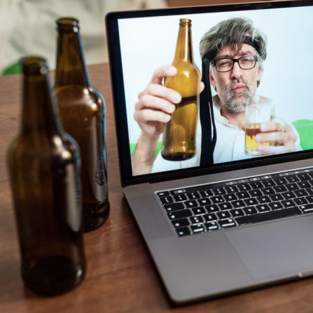 Image of drunk man on computer screen