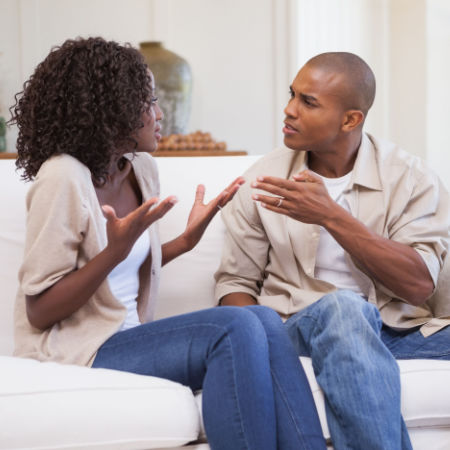 Man and woman disagreeing on a date