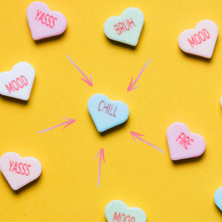 Valentine conversation hearts with arrows pointing to one that says "chill"